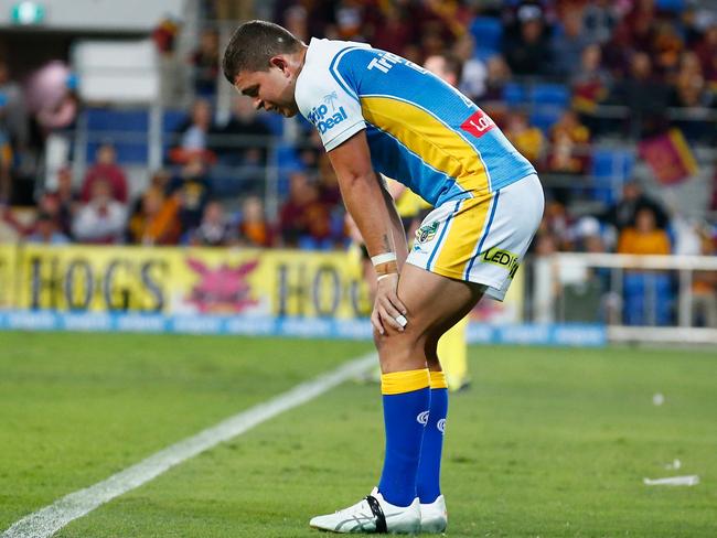 A dejected Ashley Taylor after the Broncos thrashed the Titans.