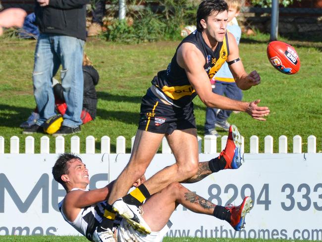 SANFL: Glenelg v Port Adelaide at Glenelg Oval, Sunday, May 26, 2019. Port Adelaide's Aidyn can't stop Glenelg's Max Proud. (Pic: AAP/Brenton Edwards)