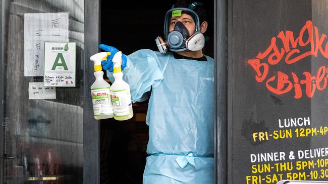 Cleaning staff working inside Bangkok Bites exposure site in Bondi. Picture: NCA NewsWire/James Gourley