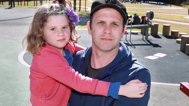 Six year old Mia with her father Jared Jacobsen poses for photographs in Caddies Creek Reserve, Beaumont Hills. Pic: AAP Image/Angelo Velardo