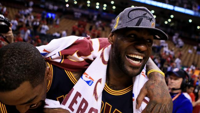 LeBron James and J.R. Smith celebrate the win.