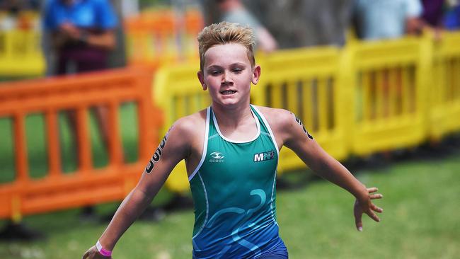 Queensland School Sports Triathlon and Aquathlon – Jed Rowlands finishes the Junior Male Aquathlon in first place. Photo: Cody Fox