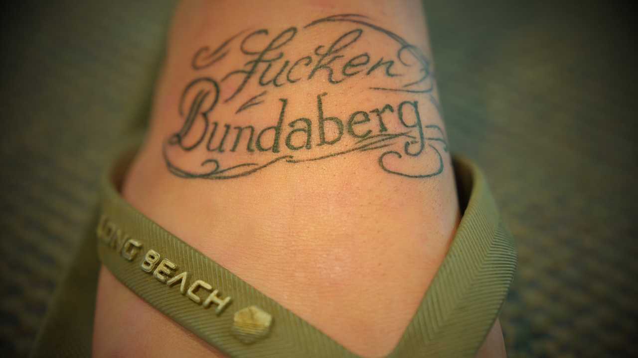 Why this backpacker has 'Bundaberg' tattooed on his foot | The Courier Mail