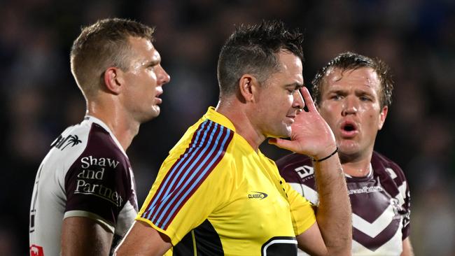 Referees chatting to the Bunker during play annoys players and fans, but maybe it makes for a better product. (Photo by Hannah Peters/Getty Images)