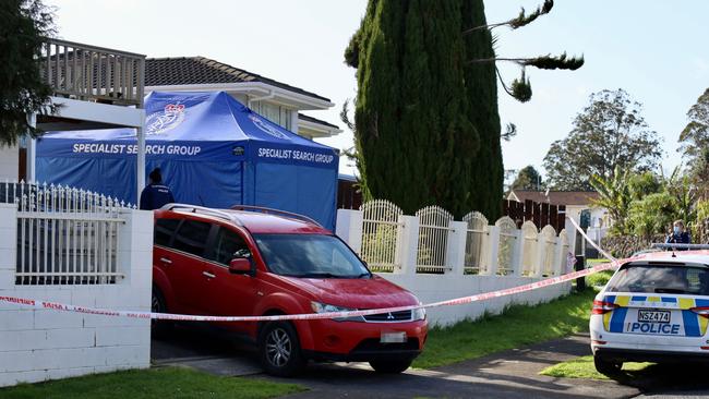 Police at the scene after the children’s remains were found. Picture: Jed Bradley/NZ Herald