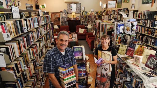 Paul Hodges and Cathy Holliday at The Annerley Community Bookshop. Picture: Peter Cronin