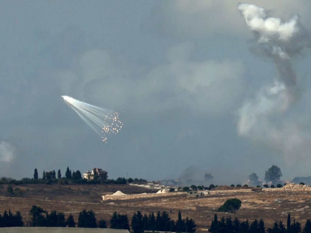 A picture taken from northern Israel along the border with southern Lebanon shows smoke billowing above the Lebanese village of Yaron during Israeli bombardment.