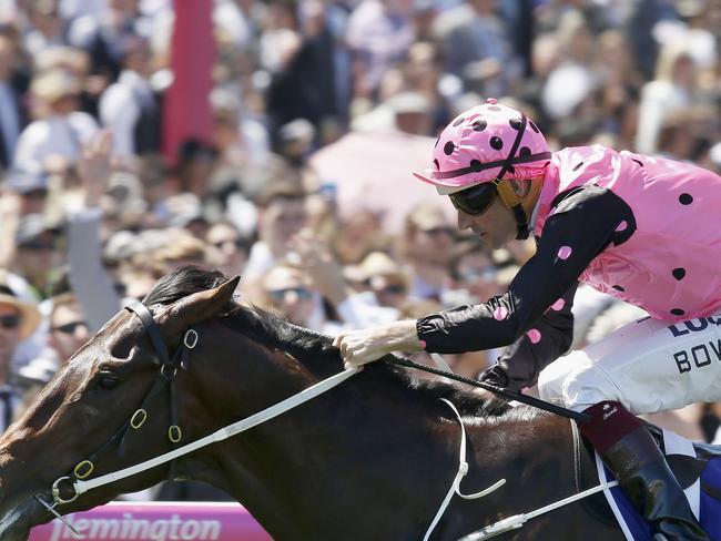 Hugh Bowman drives Flying Artie to stunning win in the Coolmore Stud Stakes. Picture: Getty Images