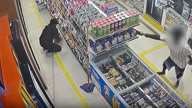 Kids run in to shoplift while a staff member stacks shelves. Picture: Supplied