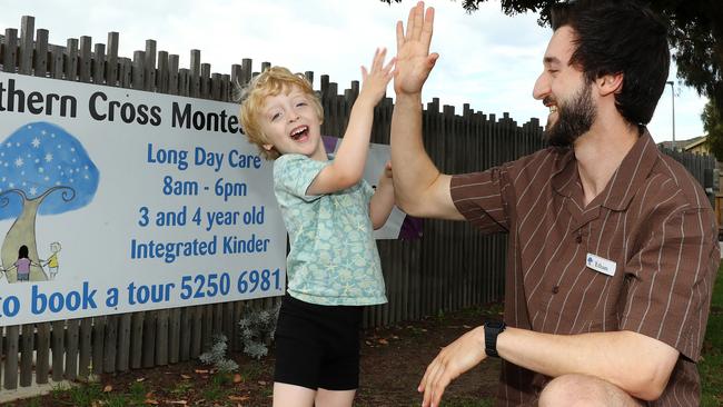 Southern Cross Montessori Leopold childcare centre's Ethan Drummond has won the Geelong Addy reader vote for the best indergarten/childcare centre teacher for 2023. Pictured with Isaac, 3. Picture: Alison Wynd