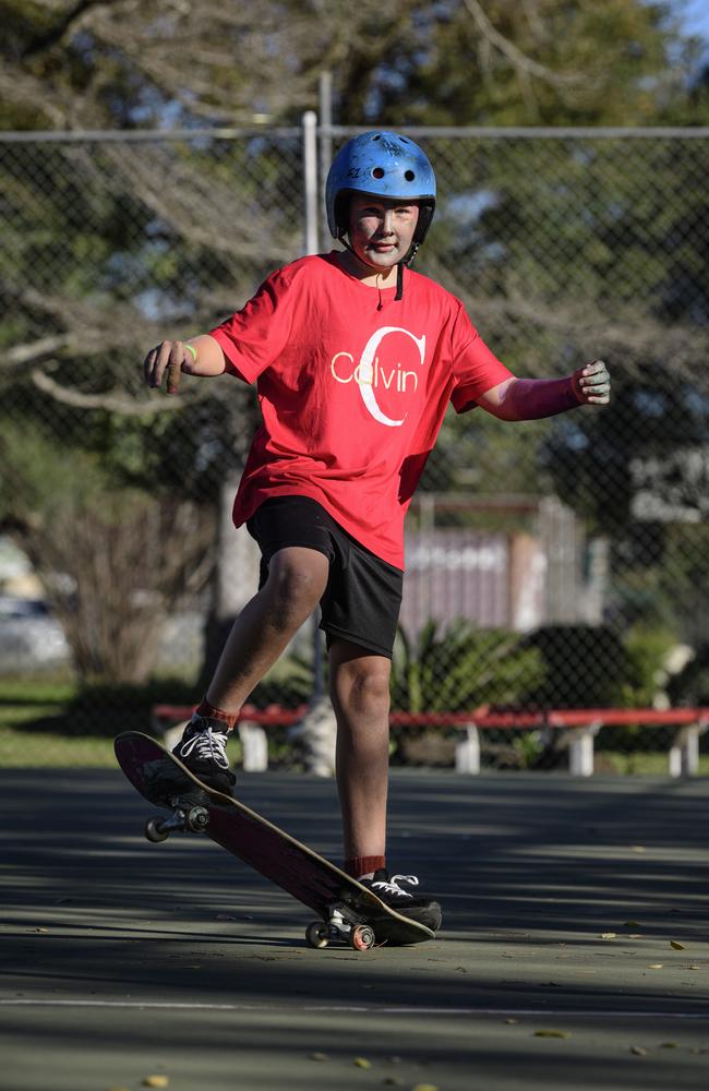 Logan Sutton learns to skateboard at Sadie's Day Out, a special community event to celebrate the life of five-year-old crash victim Sadie, held at Cambooya State School, Saturday, June 7, 2025. Picture: Kevin Farmer