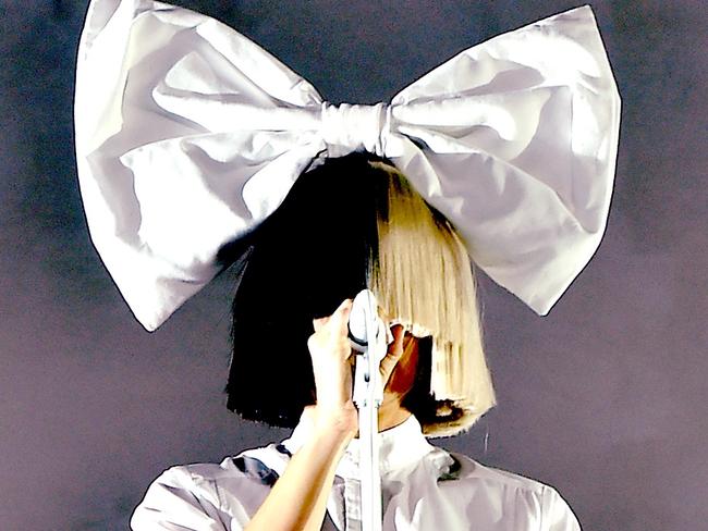 INDIO, CA - APRIL 17: (EDITOR'S NOTE: This image has been digitally filtered.) Singer Sia performs onstage during day 3 of the 2016 Coachella Valley Music & Arts Festival Weekend 1 at the Empire Polo Club on April 17, 2016 in Indio, California. (Photo by Kevin Winter/Getty Images for Coachella)