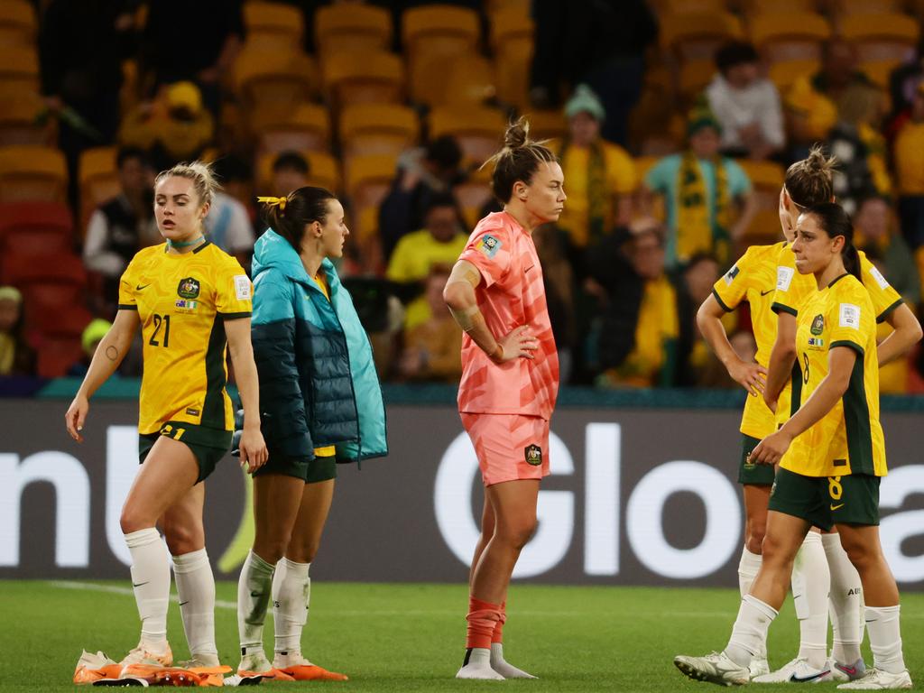 Matildas players look dejected after their loss. Picture: Lachie Millard.