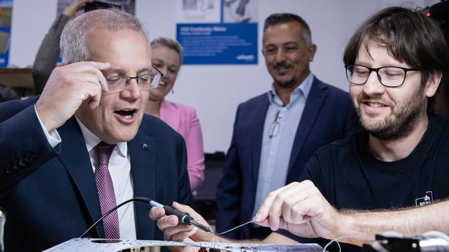 Scott Morrison (left) visits The Melt industrial prototyping lab and innovation accelerator in Lake Macquarie to announce the extension of the Trailblazer program. Picture: Jason Edwards