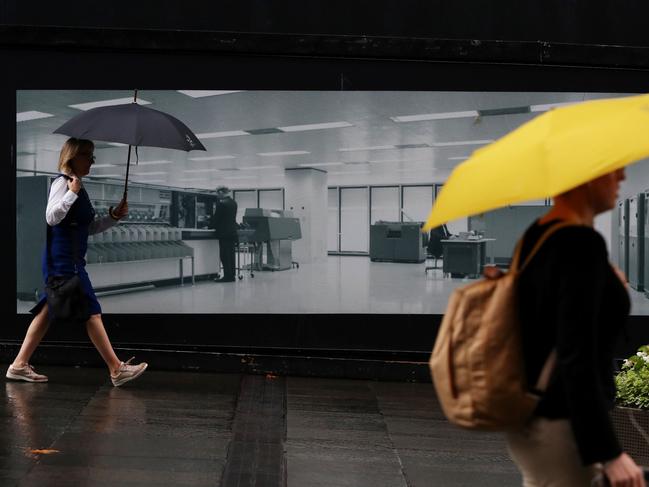 Pedestrians pass the Reserve Bank of Australia (RBA) building in Sydney, Australia, on Tuesday, Feb. 06, 2024. Australia’s central bank is widely expected to hold interest rates at a 12-year high at its first meeting of the year today. Photographer: Lisa Maree Williams/Bloomberg