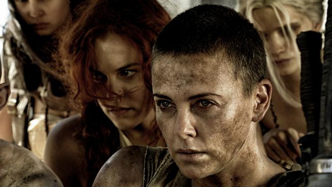 This photo released by Warner Bros. Pictures shows, from left, Riley Keough as Capable (Brainy), Courtney Eaton as Fragile (Cheedo), Charlize Theron as Furiosa, Nicholas Hoult as Nux, PHS-4, and Abbey Lee Kershaw as Wag (Smiley), in a scene from the film, "Mad Max: Fury Road." The film releases in the U.S. on May 15, 2015. (AP Photo/Warner Bros. Pictures, Jason Boland)