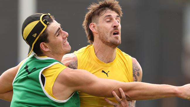 MELBOURNE, AUSTRALIA - MARCH 07: Samson Ryan of the Tigers and Sam Naismith of the Tigers compete for the ball during a Richmond Tigers AFL Training Session & Media Opportunity at Punt Road Oval on March 07, 2024 in Melbourne, Australia. (Photo by Robert Cianflone/Getty Images)