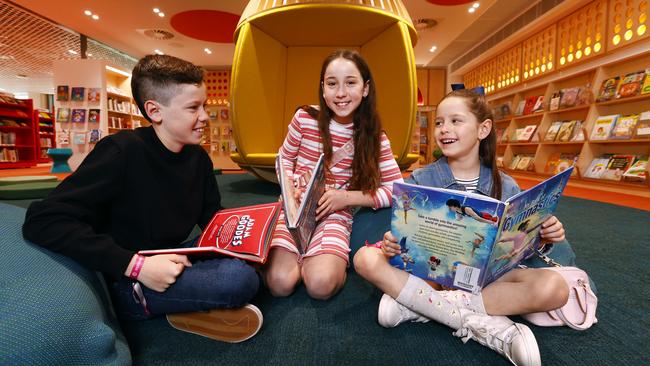 Harry, Abigail and and Emily Wigham in the children’s section. Picture: Richard Dobson