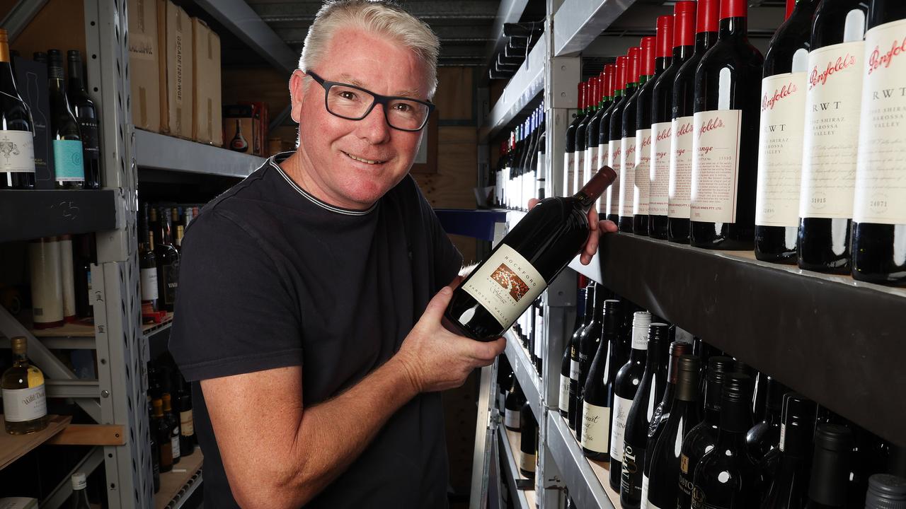 Wine auctioneer Darren Davis in his warehouse. Picture: Liam Kidston