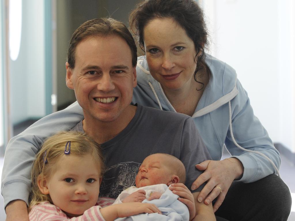 Greg Hunt with his then newborn son James, wife Paula and Poppy, aged 4 at the time.