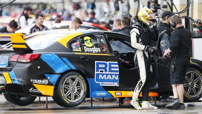 Taz Douglas of Lucas Dumbrell Motorsport exits his Holden after qualifying at Symmons Plains. Picture Chris Kidd