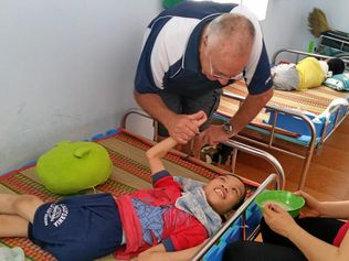 GOOD SAMARITAN: Barry Kelly was moved when he first visited an Australian-run orphanage in Ba Ria, Vietnam.