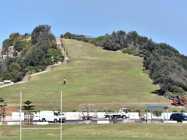 Workmen drilling under the Skillion in September 2017, a month before Mr Li disappeared. (AAP IMAGE / Troy Snook)