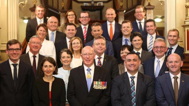 Premier Gladys Berejiklian, Deputy Premier John Barilaro and new ministers at their swearing-in ceremony at Government House last month.