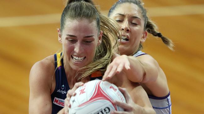 Cara Koenen (left) of the Sunshine Coast Lightning and Matilda Garrett of the Adelaide Thunderbirds