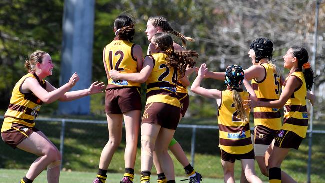 Aspley girls celebrate a Grand final win. Aspley vs Everton in the girls 13. Picture, John Gass