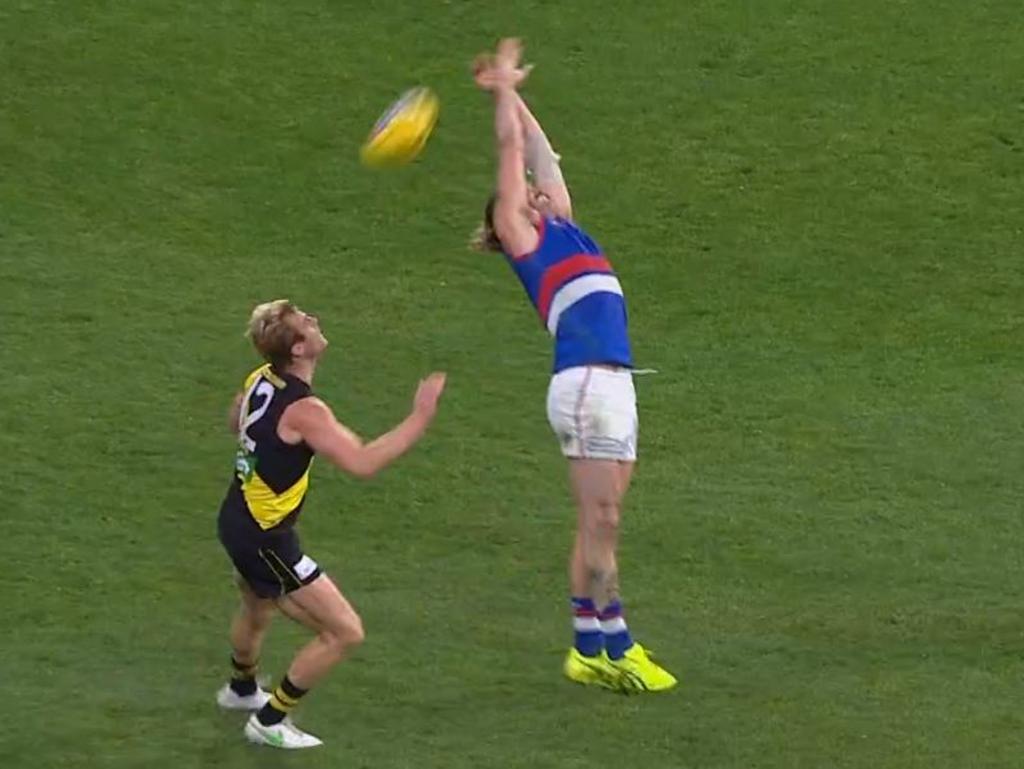 Josh Bruce runs completely under the footy.