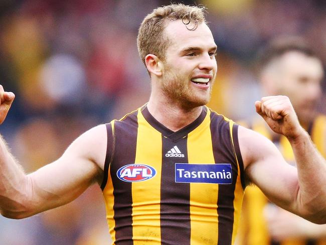 MELBOURNE, AUSTRALIA - AUGUST 04:  Tom Mitchell of the Hawks celebrates the win on the final siren during the round 20 AFL match between the Hawthorn Hawks and the Essendon Bombers at Melbourne Cricket Ground on August 4, 2018 in Melbourne, Australia.  (Photo by Michael Dodge/Getty Images)