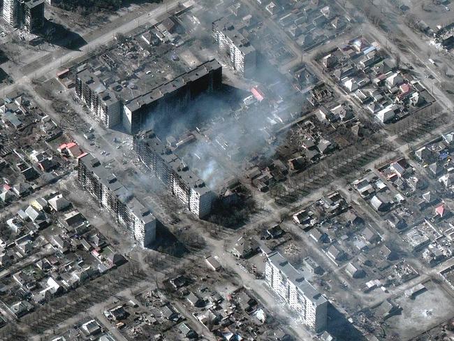 Burning and destroyed high-rise apartment buildings in Mariupol, Ukraine. Picture: Satellite image Â©2022 Maxar Technologies / AFP