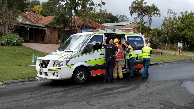 An ambulance at the scene of the fire in Parkwood this morning. Picture: Jerad Williams.
