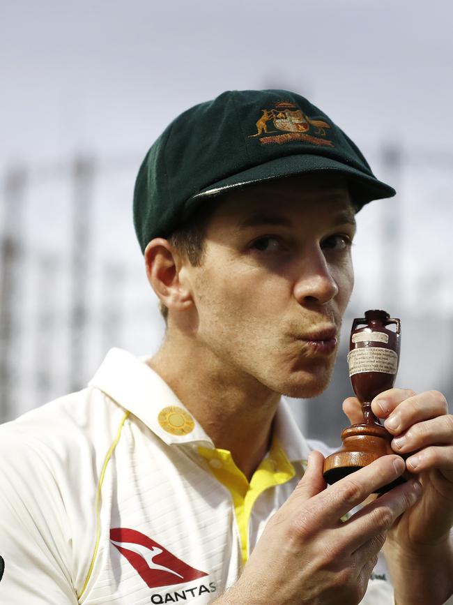 Tim Paine of Australia celebrates with the Urn after Australian drew the series to retain the Ashes in England. Picture Getty