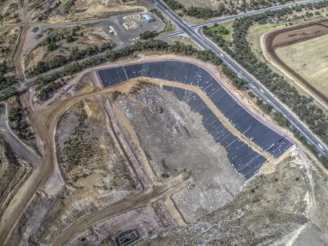 Drone images of the Southern Waste Depot landfill site, about 4km west of McLaren Vale, showing construction of the new double-lined disposal cell (cell 3). The company Southern Waste Resourceco Pty Ltd has applied to the EPA to receive, treat and dispose of PFAS-contaminated solid waste at the site. Supplied: EPA