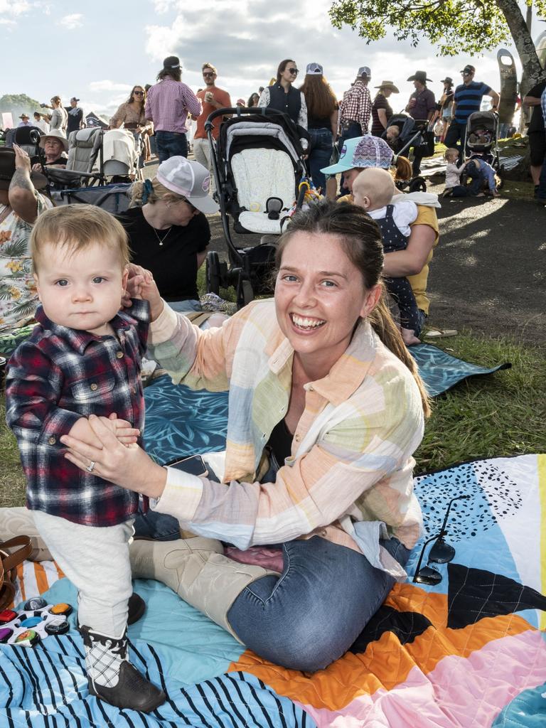 10 month old Leo O'Hara dances with his mother Kayla O'Hara. Meatstock 2023 at Toowoomba Showgrounds. Friday, April 14, 2023. Picture: Nev Madsen.