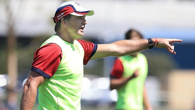 Paul Roos takes control at Melbourne training. Picture: Wayne Ludbey