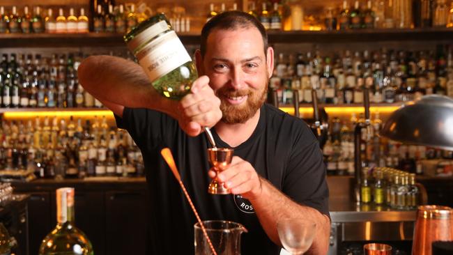 Nigel Weisbaum mixing a gin cocktail at the Archie Rose distillery in Rosebery. Picture: Bob Barker