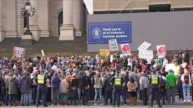 Protesters on the steps of Parliament House. Picture: AAP