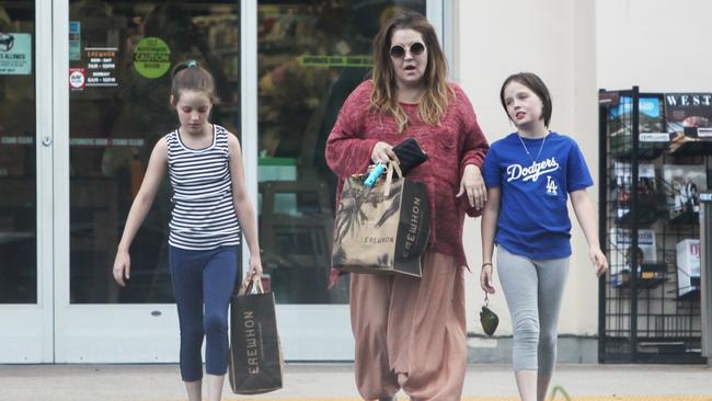 Lisa Marie Presley was spotted grocery shopping with her daughters Finley Aaron Love and Harper Vivienne Ann earlier this week. Picture: BACKGRID Australia