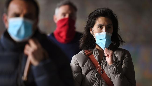 Wearing a face mask in public is something we’ll continue to do for some time, according to coronavirus experts.