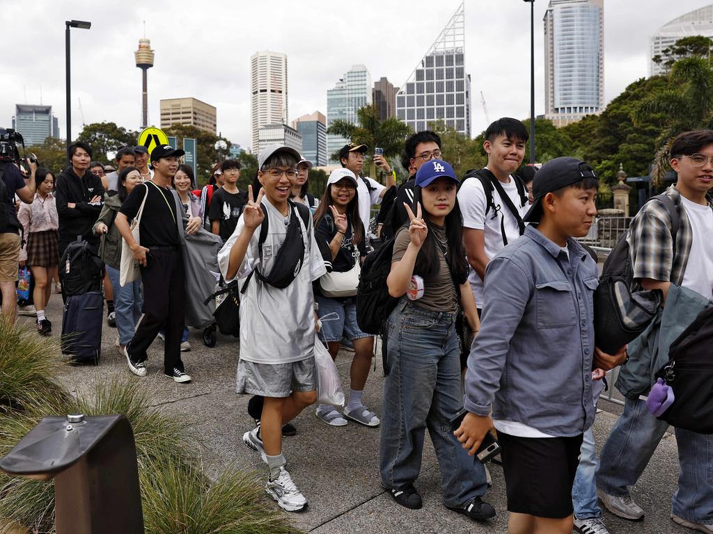 Lines filter in to get a spot at Lady Macquarie’s Chair on Tuesday morning. Picture: Sam Ruttyn