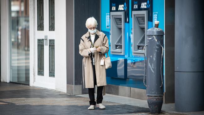 A masked shopper during COVID-19 pandemic in Manly. Picture: Julian Andrews.