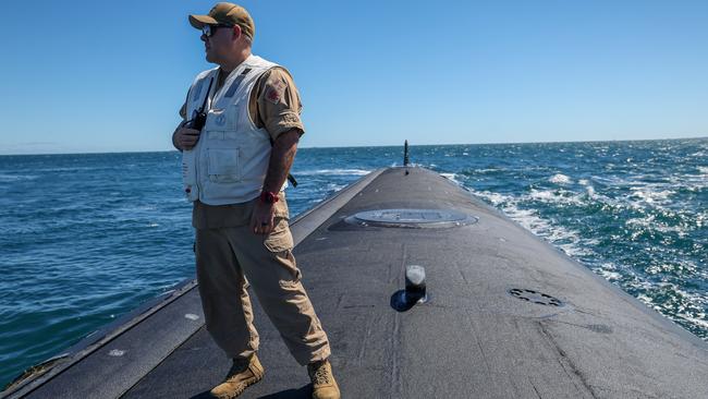 Master Chief Missile Technician Kevin Lewis on the stern of the USS Minnesota Virginia-class fast attack submarine. Picture: Colin Murty/Pool/via NewsWire