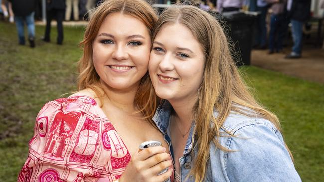 Chloe Lanagan (left) and Kaitlyn Hughes at the Clifton Cup races hosted by Clifton Jockey Club, Saturday, October 22, 2022. Picture: Kevin Farmer