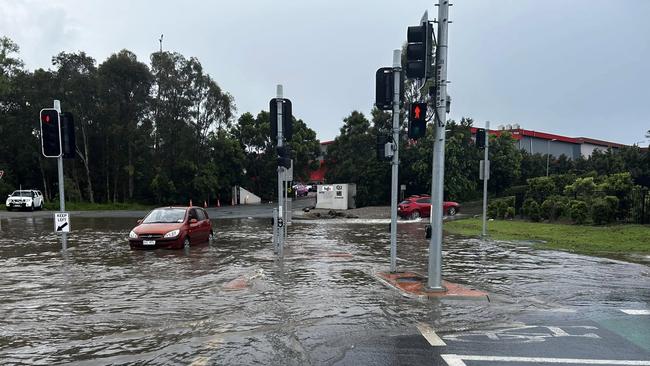 Roads went under at Upper Coomera during a big downpour. Pic: Facebook