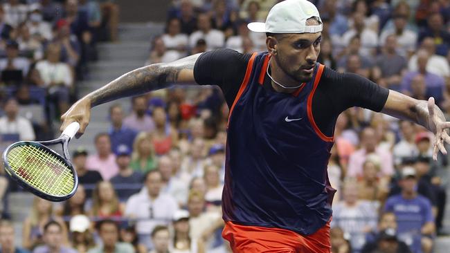 Nick Kyrgios returns against Daniil Medvedev during their fourth round match Picture: Getty Images