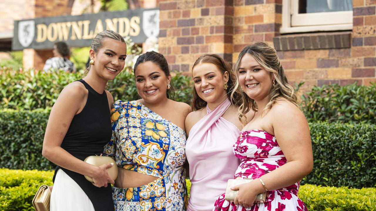 Graduates (from left) Meg Combarngo, Nina McAndrew, Libby White and Eden Fechner as Downlands College year 12 students come together for their valedictory mass on Saturday, November 16, 2024. Picture: Kevin Farmer