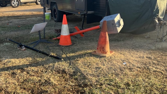 The power pole and caravan awning were torn off during the robbery. Picture: Townsville Bulletin